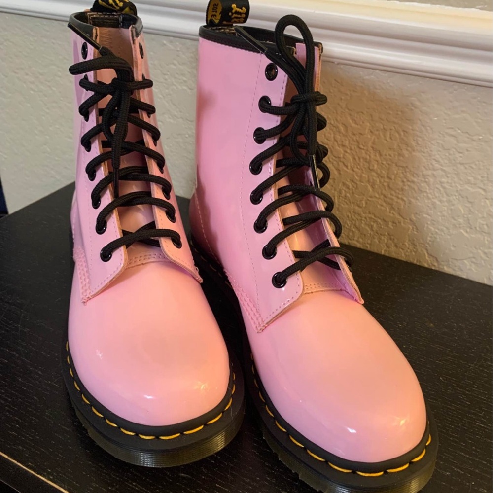 Pastel Pink Combat Boots with Lace-Up Design and Chunky Sole
